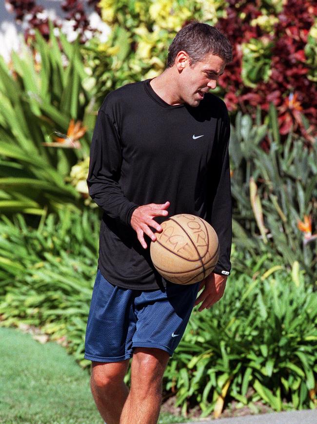 George Clooney on the basketball court at the Sheraton Mirage