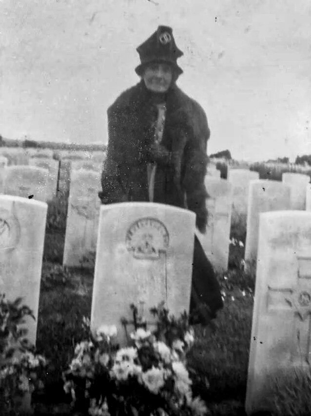 Grace Page (nee McKean) 1862-1950, mother of Alexander and James Page, stands at James' graveside in Belgium, circa 1927 when she visited with daughters, Mabel and Grace.