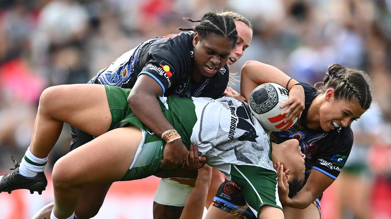 Destiny Brill of the Maori All Stars is tackled by Sareka Mooka.