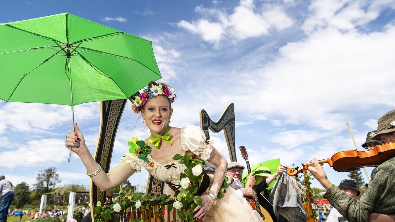 Pauline Kenny on the Darling Downs Irish Club float in the Grand Central Floral Parade of Carnival of Flowers 2022, Saturday, September 17, 2022. Picture: Kevin Farmer