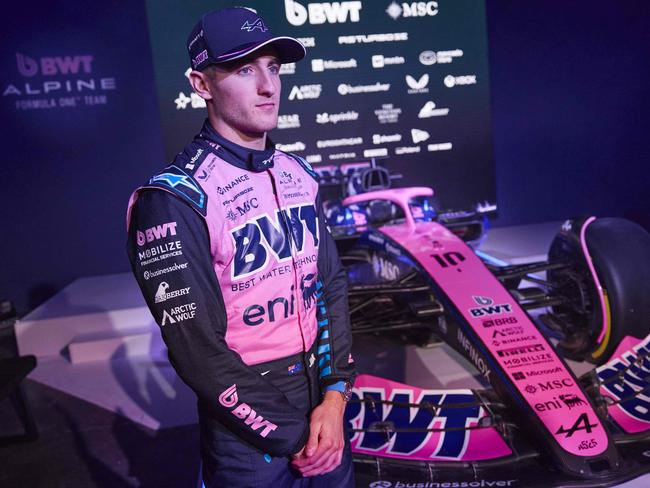 Alpine's Australian driver Jack Doohan is pictured by the team's A525 Formula One racing car during the BWT Alpine F1 Team's 2025 season launch, in London on February 18, 2025. (Photo by BENJAMIN CREMEL / AFP)