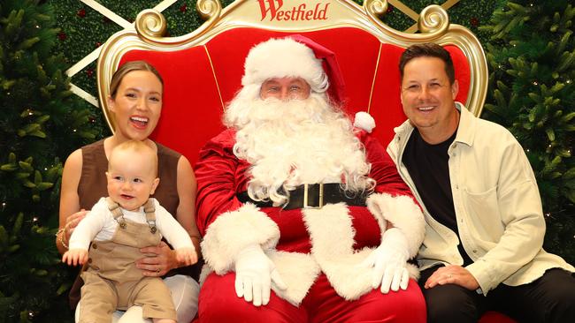 Sarah and Jake Briggs and nine-month-old son Frankie meet Santa at Westfield Geelong. Picture: Alison Wynd