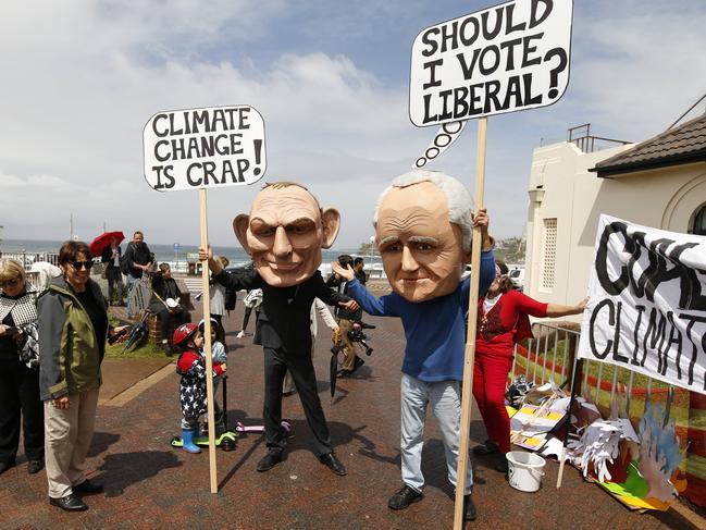 Residents Calling for Climate Action group battle other Wentworth residents dressed as Scott Morrison and Tony Abbott.