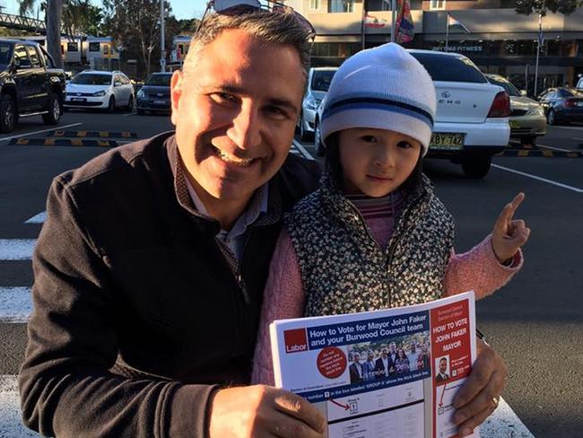 Incumbent Burwood Labor mayor John Faker with a young supporter urging people to 