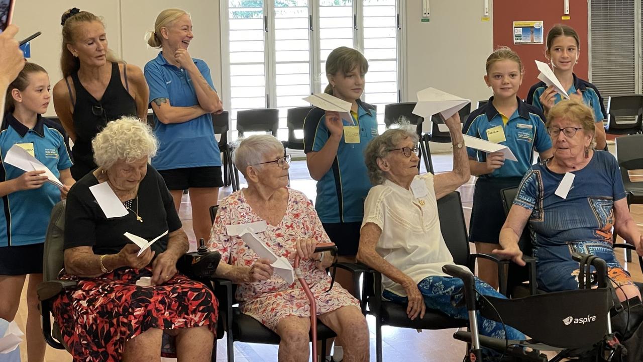 Flying paper planes was all part of fun between Port Douglas State School students and the Mossman Hospital aged care group after they teamed up to launch their new senior buddies program this week. Picture: supplied