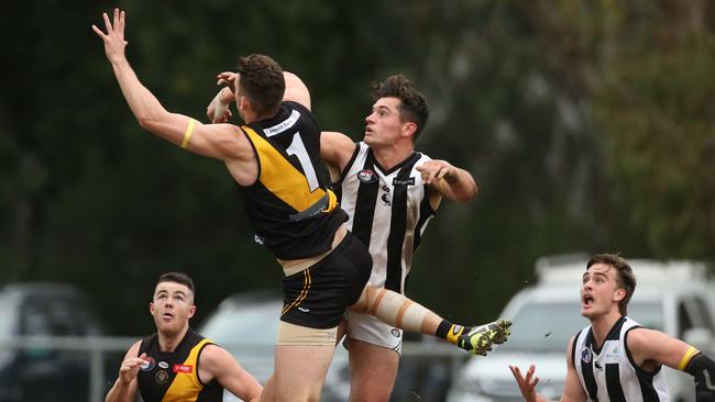 Sam Gilmore wins the tap over Patrick Fitzgerald. Picture: Stuart Milligan