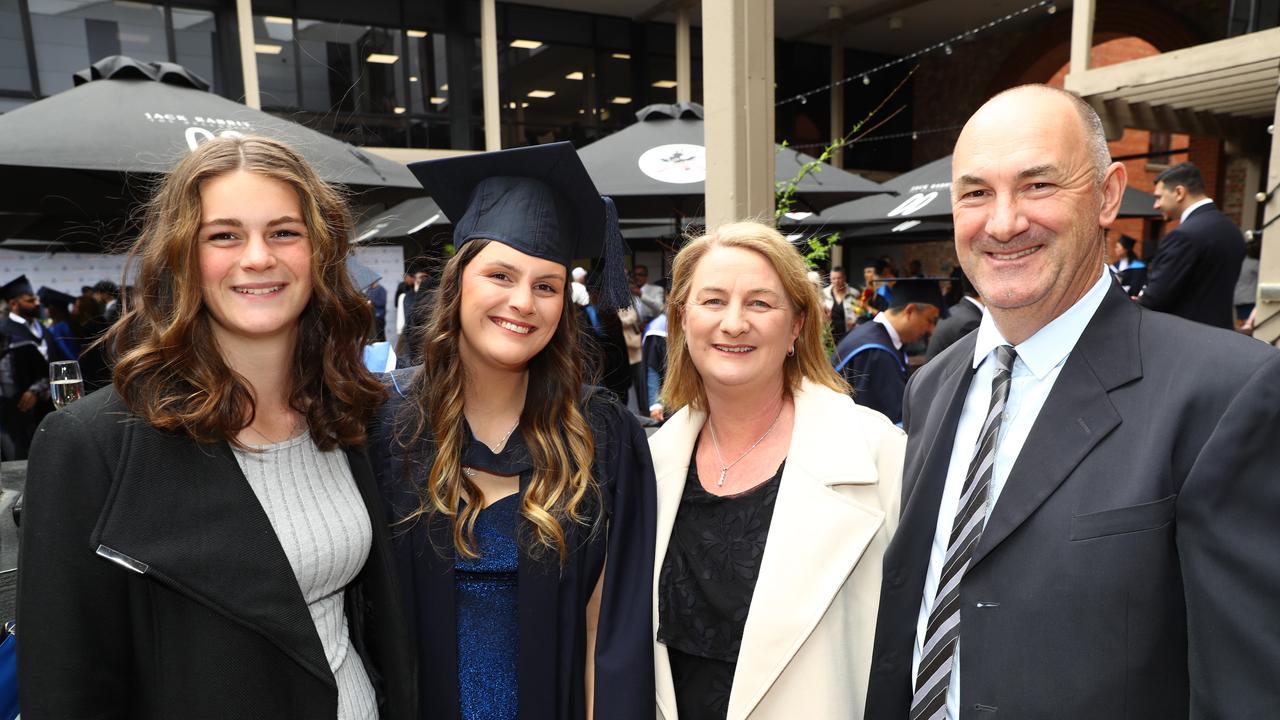 Deakin University graduate Jenna Cole and sister Bethany and parent Michelle and Paul. Picture: Alison Wynd