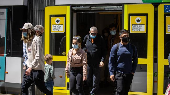 Masks are currently mandatory in retail and high-risk settings, including public transport. Picture: Paul Jeffers