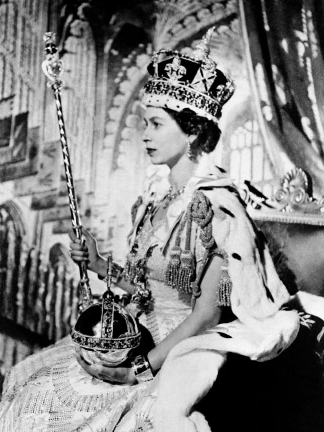 Queen Elizabeth II poses on her coronation day in London at Westminster Abbey on June 2, 1953.