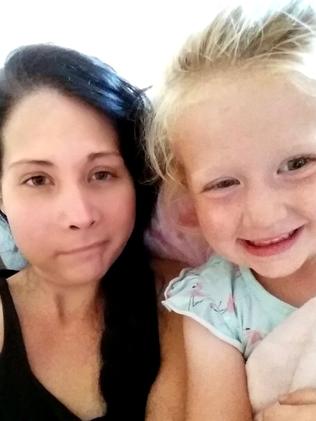 Three weeks after the op, with daughter Leylah. Picture: Caters News