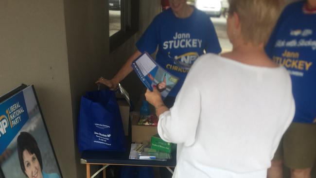 The volunteer with LNP how to vote cards. Picture: Supplied