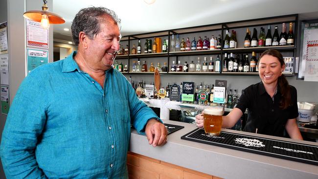 Old-school publican Tony Condon outside the Currumbin Creek Tavern which he formerly owned, seen here with Maddi Sawyer-Clayton. Pics Adam Head