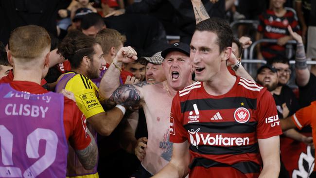 SYDNEY, AUSTRALIA – APRIL 19: Wanderers fans celebrate a goal by Anthony Pantazopoulos of the Wanderers only for it to be overturned during the round 27 A-League Men match between Western Sydney Wanderers and Melbourne City at CommBank Stadium, on April 19, 2025, in Sydney, Australia. (Photo by Darrian Traynor/Getty Images)