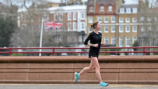 A jogger in Battersea Park, London, on Tuesday. Picture: AFP