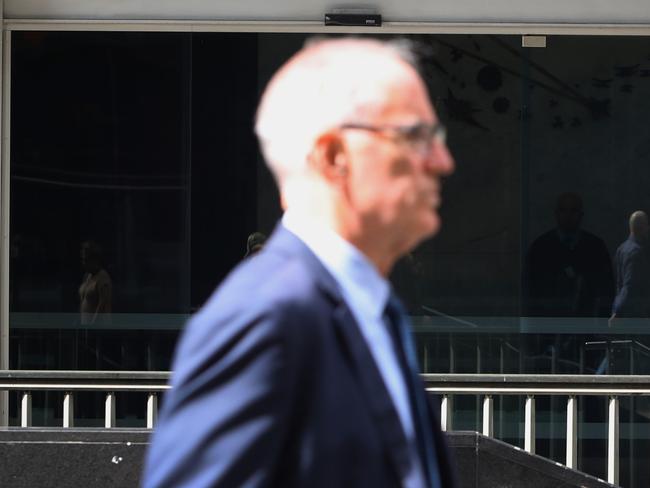 SYDNEY, AUSTRALIA - OCTOBER 18: A pedestrian moves past the Reserve Bank of Australia (RBA) building on October 18, 2022 in Sydney, Australia. Australia's Treasurer Jim Chalmers said last week that the country will not be immune from a darkening outlook for global inflation and interest rates, but that he expects Australia to be able to weather the turbulent economic headwinds better than most. (Photo by Lisa Maree Williams/Getty Images)