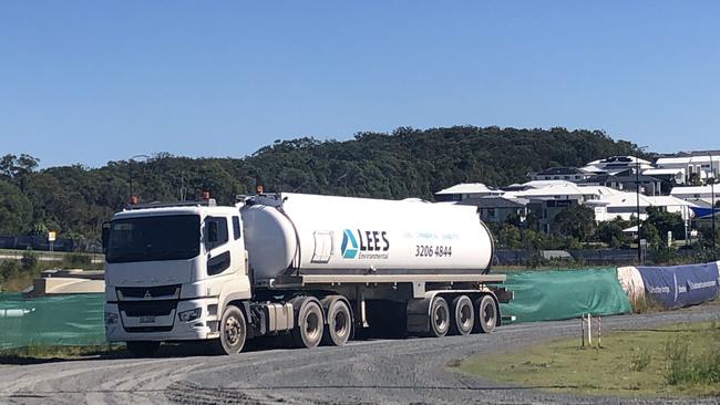 Sewage tankers at Redland Bay service the Shoreline estate opposite. Sewage from the Villawood estate will be trucked to Logan while the sewerage treatment plant is being built at Redland Bay. Picture: Judith Kerr