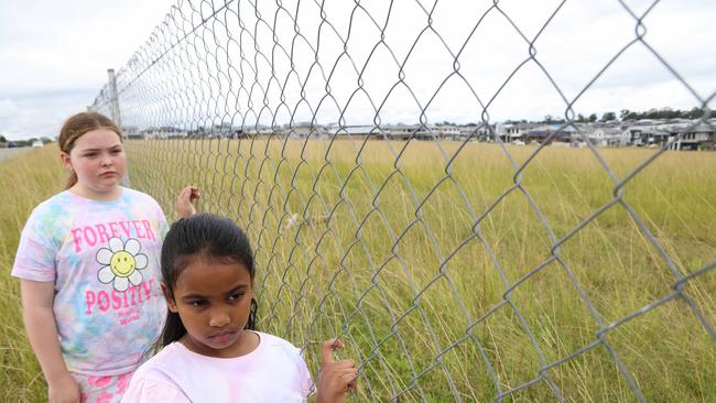 Methmi Premaratne and Mia Philips at a proposed Box Hill school site. Picture: Damian Shaw