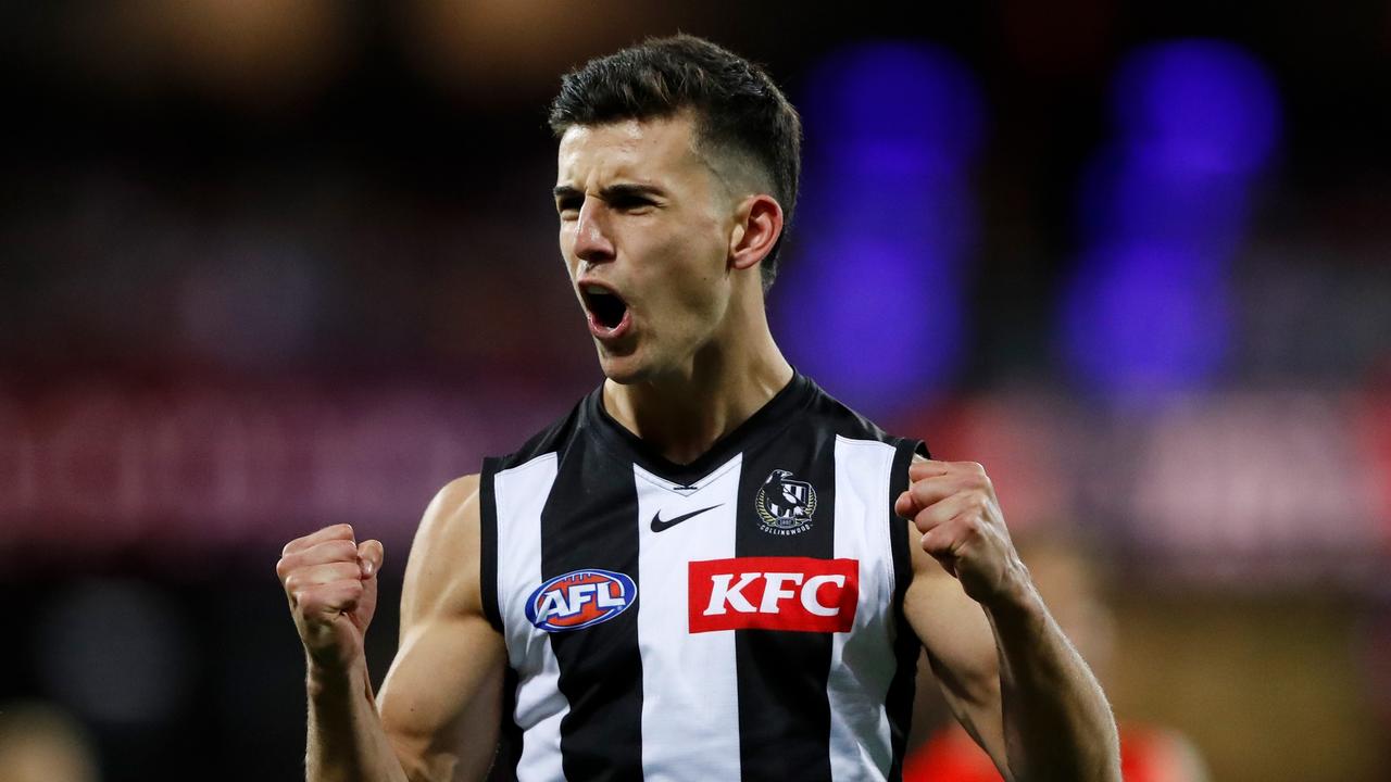 Nick Daicos celebrates a third-quarter goal.