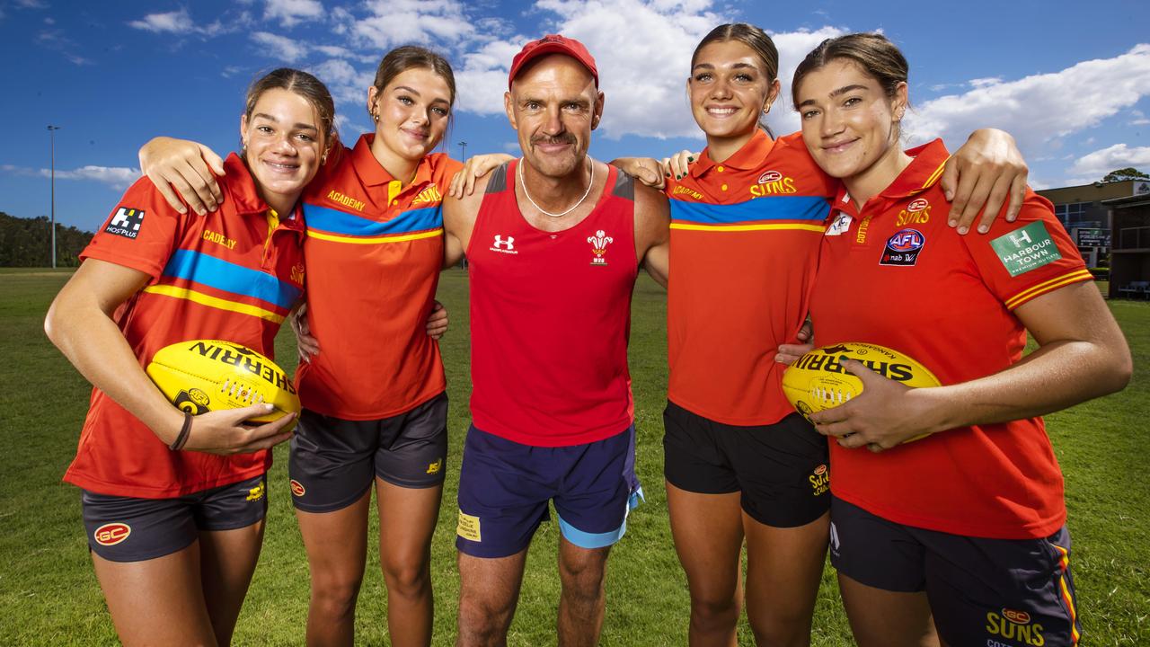 AFLW sisters on the Gold Coast Suns list for the AFL feature spread. Good story angle – they're Welsh and dad played rugby for Wales. Darren Davies with his girls Georja, Fleur, Darcie and Giselle. Picture: NIGEL HALLETT