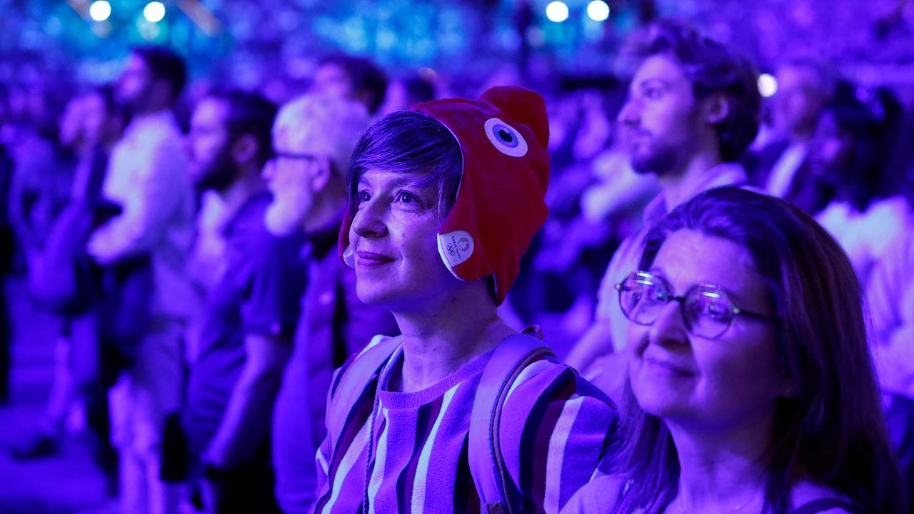 A participant wears a Phrygian hat during the convention of volunteers for the Paris 2024 Olympic and Paralympic Games. Picture: Ian Langsdon / AFP