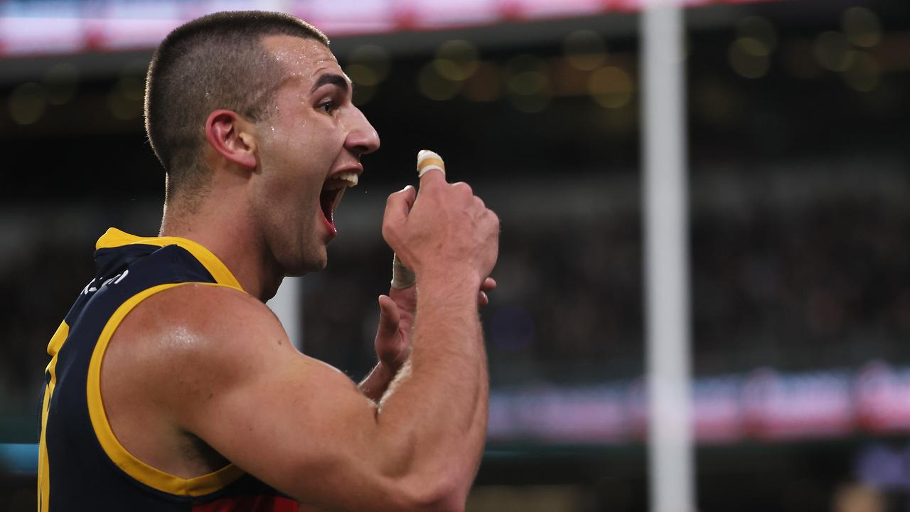 ADELAIDE, AUSTRALIA - AUG 17: Josh Rachele of the Crows gestures to the crowd after scoring a goal during the 2024 AFL Round 23 match between the port Adelaide Power and the Adelaide Crows at Adelaide Oval on August 17, 2024 in Adelaide, Australia. (Photo by James Elsby/AFL Photos)