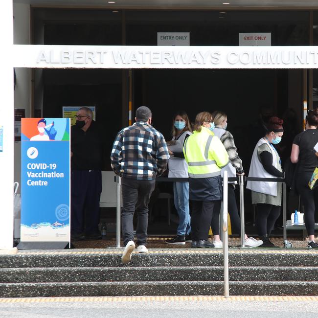Day three of the Gold Coast lockdown.CoVid-19 queue at Albert Waterways hall. . Picture Glenn Hampson