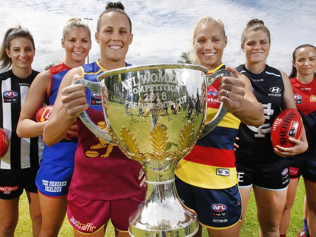 AFLW Launch. AFLW teams captains Amanda Farrugia GWS, Steph Chiocci Collingwood, Emma Zielke Brisbane Lions, Kaitie Brennan Western Bulldogs, Erin Phillips Adelaide Crows, Bri Davey Carlton, Daisy Pearce Melbourne and Kara Donnellan Fremantle with the AFLW trophy.      Picture: David Caird