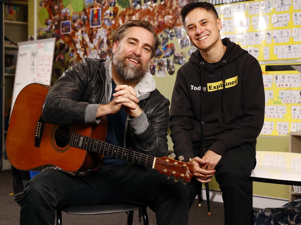 Australian singer-songwriter Josh Pyke, left, and hip hop artist Rhyan Clapham (DOBBY), hope to recruit 100 schools and raise $100,000 to help create more books in native languages for Aboriginal and Torres Strait Islander children living in remote communities. Picture: Richard Dobson