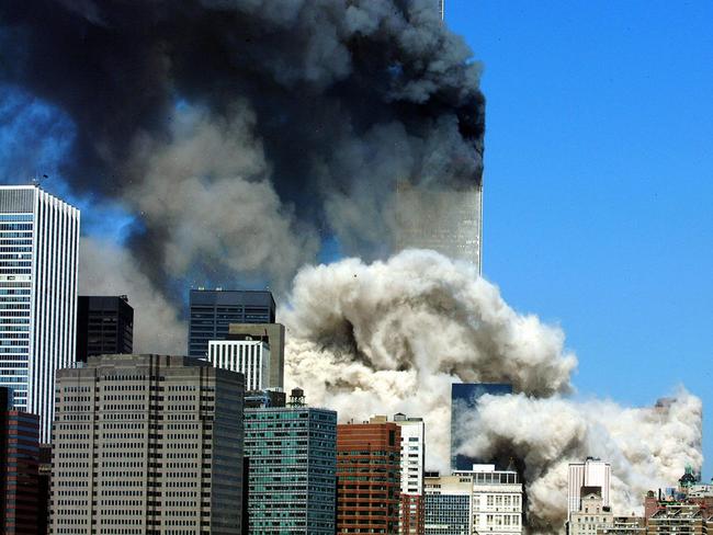 Smoke billowing after the first of the two towers of the World Trade Centre collapses in New York City. Picture: AFP