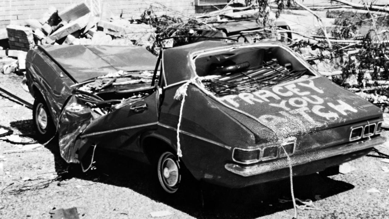 The image that defined a disaster: John Garner's crumpled Holden Torana with the deathless phrase 'Tracey [sic] You Bitch' painted on. Picture: Supplied