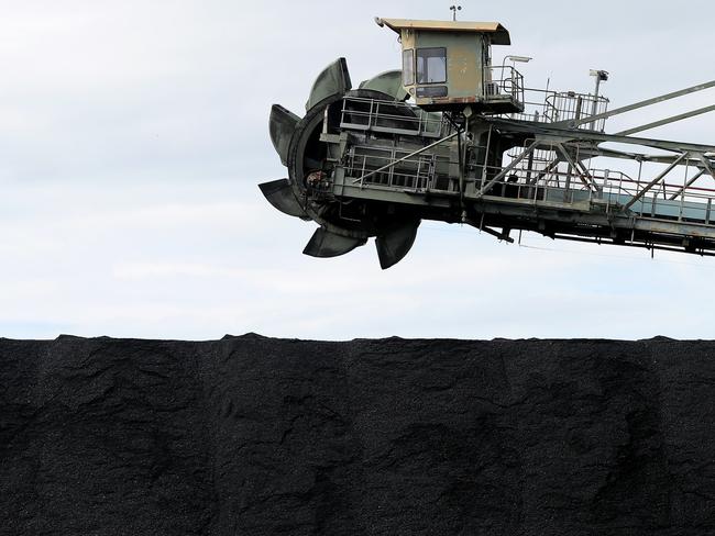 A stockpile of coal at Eraring Power Station in Eraring, New South Wales, Australia, on Thursday, April 28, 2022. At Eraring Power Station's cavernous turbine hall as much as 6 million tons of coal a year is crushed and loaded into furnaces which reach temperatures of 1,480 degrees Celsius (2,696 Fahrenheit)  about enough to melt steel  to heat 24-story high water-filled boilers. Photographer: Brendon Thorne/Bloomberg via Getty Images