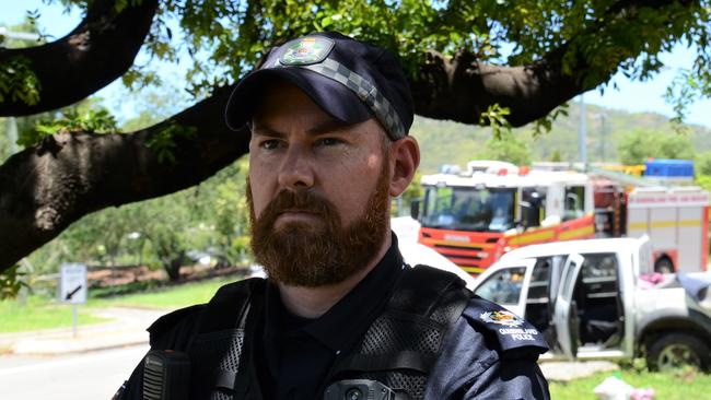 Acting Senior Sergeant Jonathan Searle at the scene of the crash. Picture: Natasha Emeck