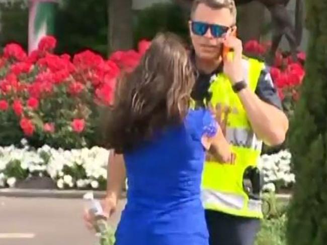 Melbourne Cup race-goer Sarah Finn takes on Acting Superintendent Steven Cooper at Flemington Racecourse.