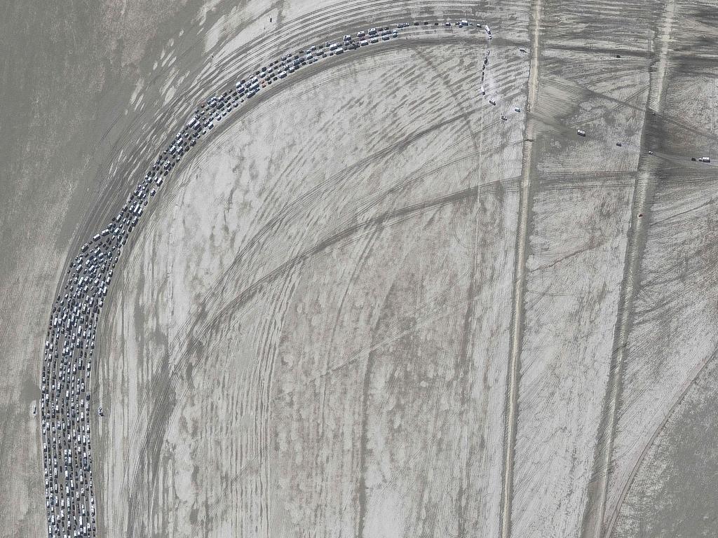 An overview of the traffic jam of people leaving the annual Burning Man festival in Nevada. Picture: Satellite image Â©2023 Maxar Technologies / AFP