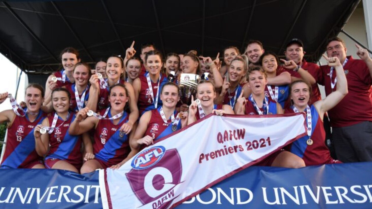 UQ celebrate their 2021 QAFLW premiership. Picture: AFLQ.