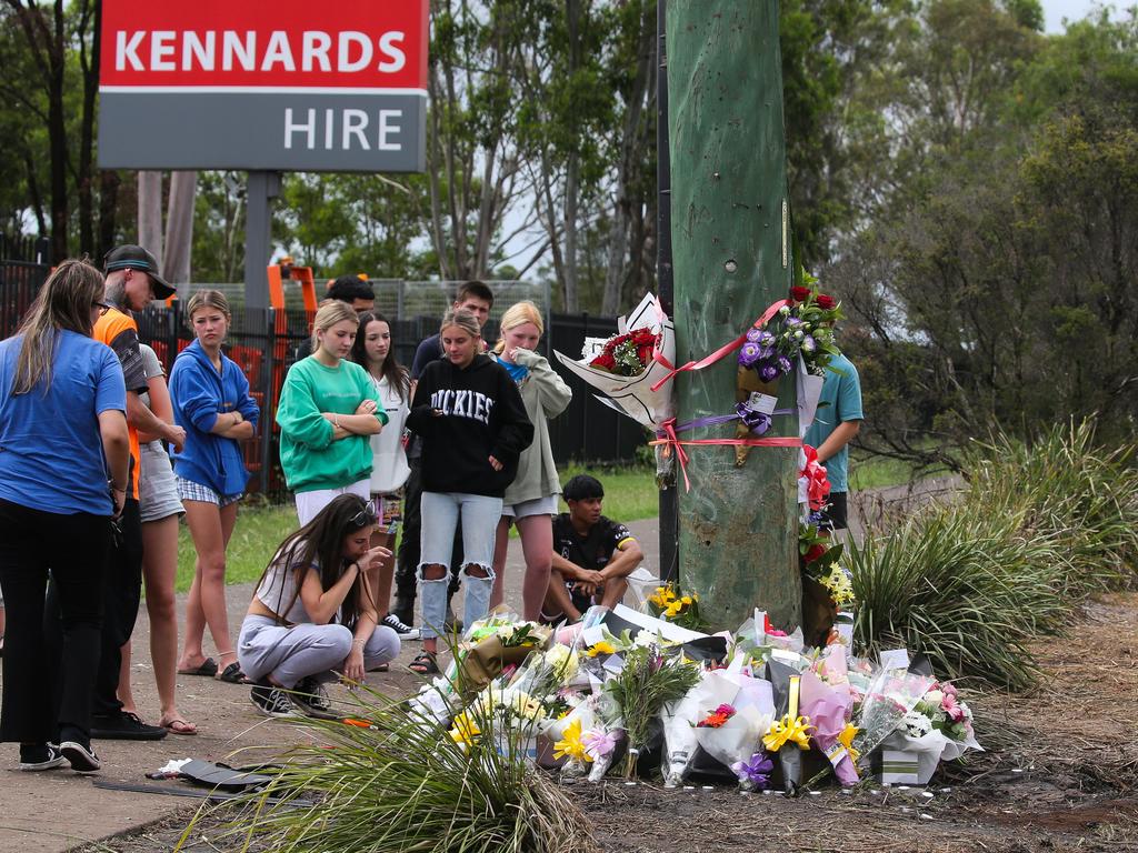 Mourners at the site of the crash on Tuesday afternoon. Picture: NCA NewsWire