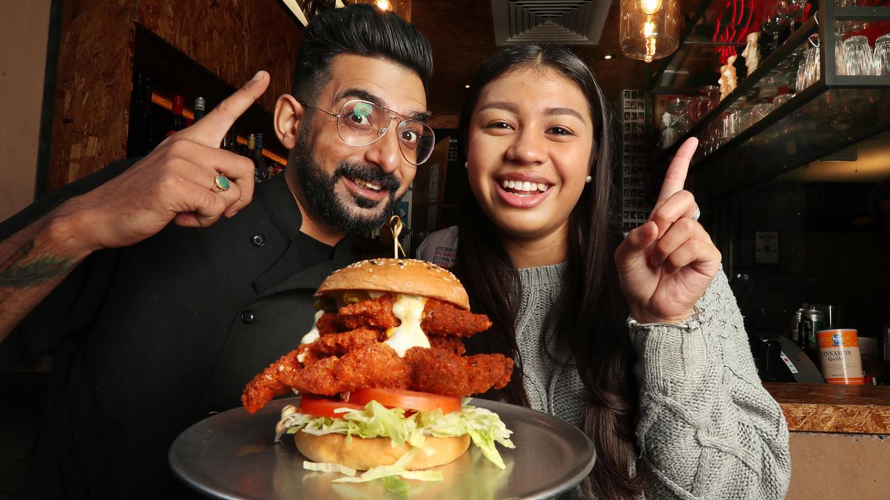 Chef Vishal Arora and She-arna Booker from Laneway bar Red Hook which is competing to create Australia’s top burger. Pic: Annette Dew