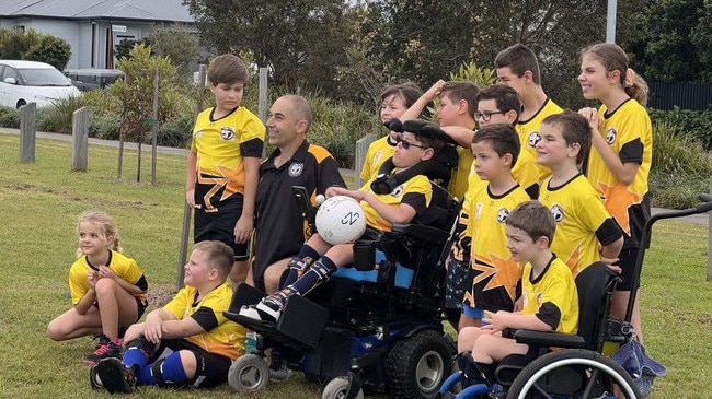 Manager Trevor Picken and his members of the all abilities program at the Sunshine Coast Churches Soccer Association. Photo: contributed.