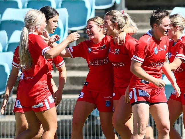 Try time. The Illawarra Steelers celebrating a try against the Rabbitohs. Photo: Denis Ivaneza