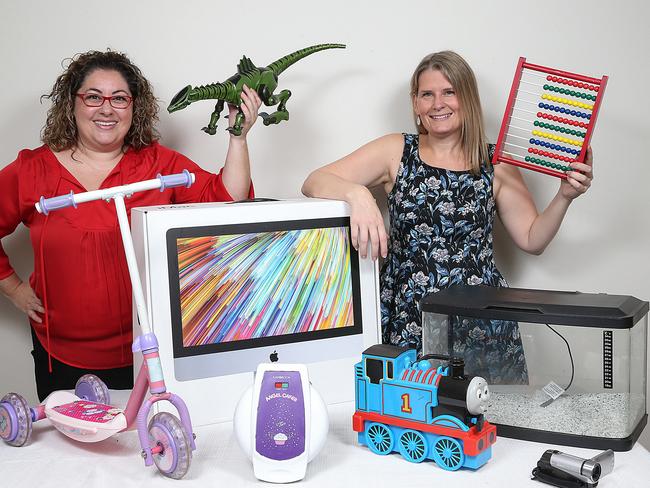 Kelly Winder has hired a professional organiser, Amy Revell, to help her clear the house. Picture: Ian Currie