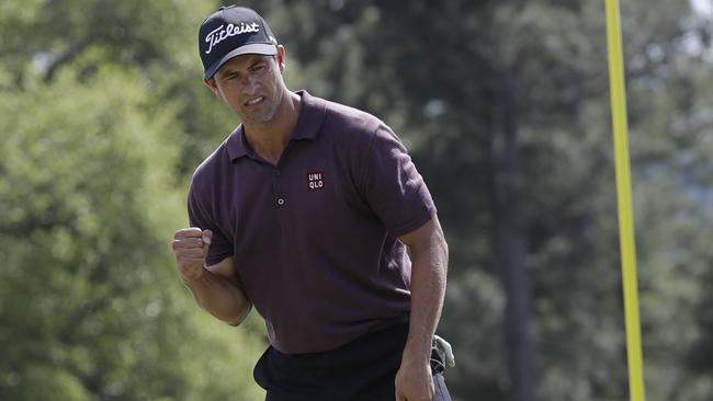 Adam Scott reacts after his birdie on the 18th hole. Picture: AP