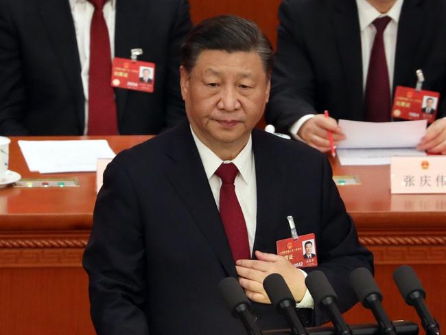 Xi Jinping, China's president, during the closing session of the First Session of the 14th National People's Congress (NPC) at the Great Hall of the People in Beijing, China, on Monday, March 13, 2023. Chinese PresidentÃÂ Xi JinpingÃÂ capped this year's National People's Congress by securing a third, norm-defying term in office and shaping some of the policies that will steer the worlds second-largest economy through the year ahead. Photographer: Qilai Shen/Bloomberg via Getty Images