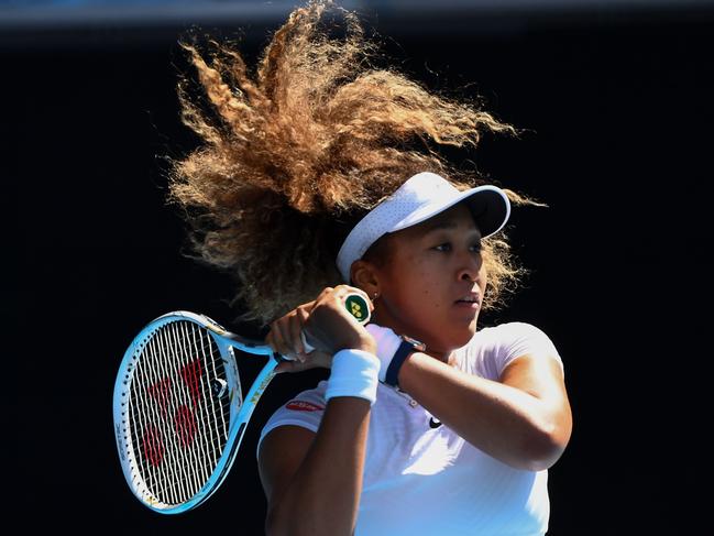 Japan's Naomi Osaka hits a return against France's Alize Cornet during their Gippsland Trophy women's singles tennis match in Melbourne on February 2, 2021. (Photo by William WEST / AFP) / -- IMAGE RESTRICTED TO EDITORIAL USE - STRICTLY NO COMMERCIAL USE --