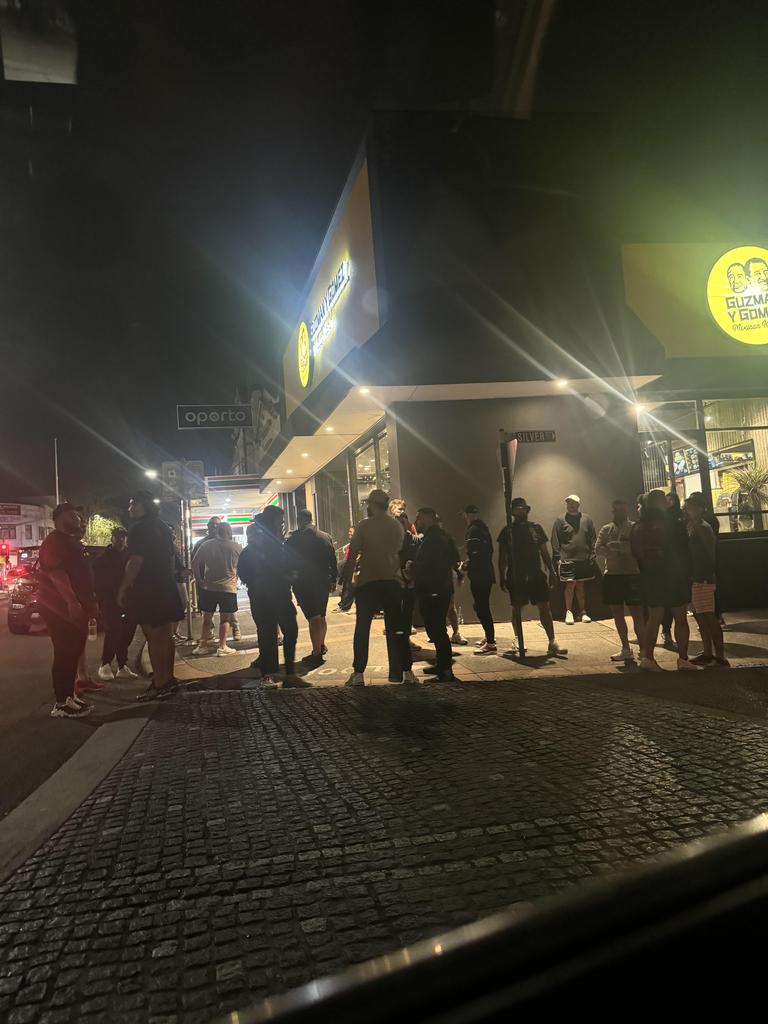 A vigil held outside Guzman y Gomez Marrickville for the man fatally stabbed on Monday. Picture: Supplied