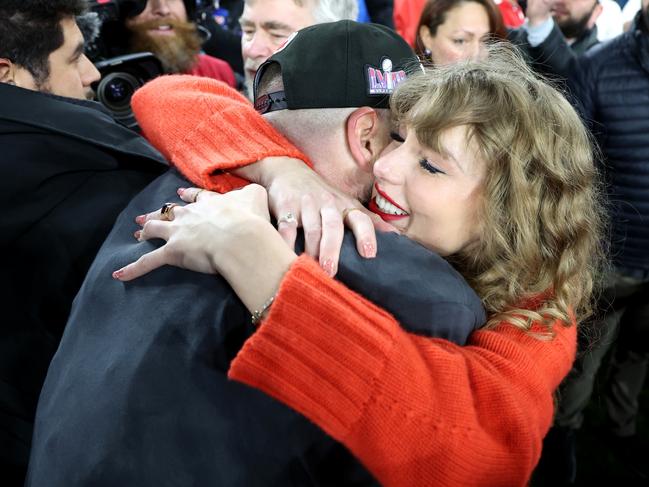 BALTIMORE, MARYLAND - JANUARY 28: Travis Kelce #87 of the Kansas City Chiefs celebrates with Taylor Swift after a 17-10 victory against the Baltimore Ravens in the AFC Championship Game at M&T Bank Stadium on January 28, 2024 in Baltimore, Maryland. (Photo by Rob Carr/Getty Images)