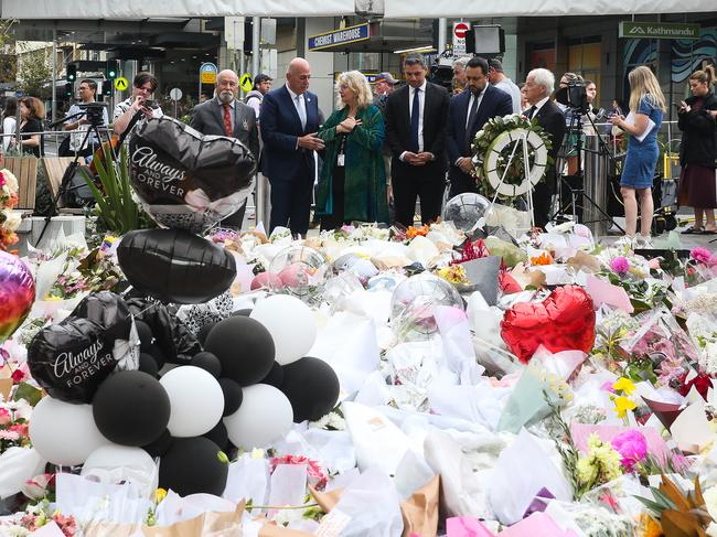 SYDNEY, AUSTRALIA: Newswire Photos : APRIL 17 2024:  Mayor of Waverley Paula Masselos, Mayor of Hornsby Philip Ruddock, Lord Mayor Pierre Esber, Mayor of St Georges River Council Sam Elnir, Mayor of Liverpool Ned Mannoun andDeputy Mayor of Blacktown Chris Quilkey gather to pay respects to the lives lost on Saturday and lay wreaths at Bondi Junction. Picture: NCA Newswire / Gaye Gerard