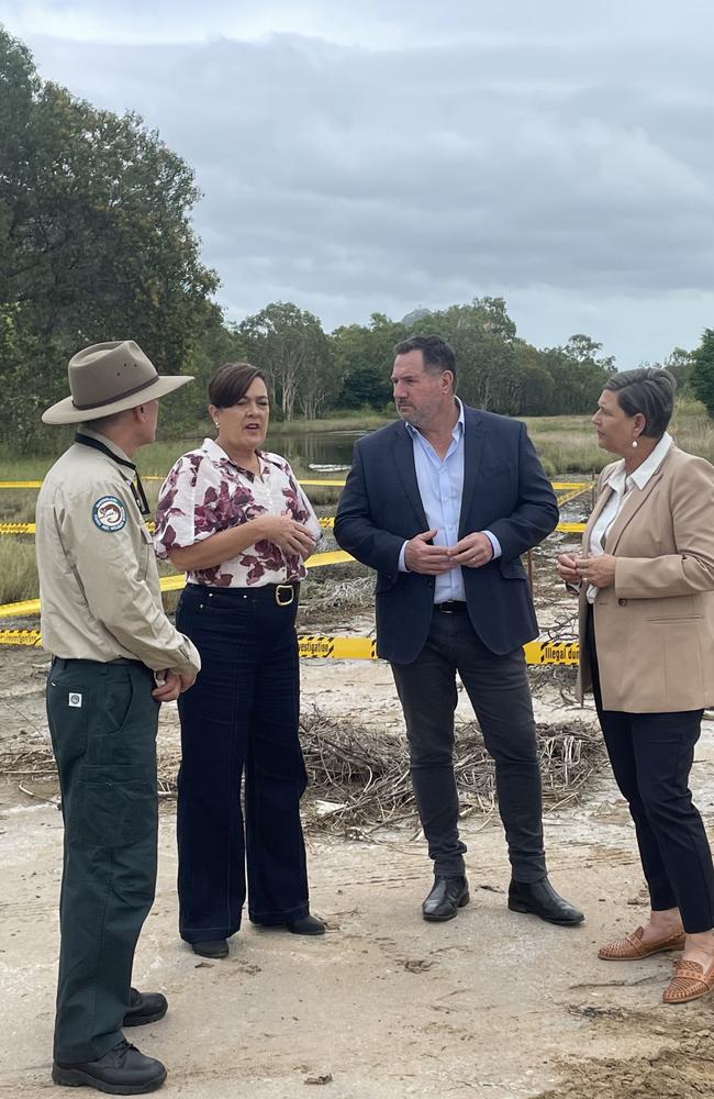 QPWS Senior Conservation Officer Craig Dunk with Thuringowa MP Natalie Marr, Environment Minister Andrew Powell and Mundingburra MP Janelle Poole at an illegal dump site in Townsville.
