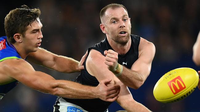 Carlton defender Sam Docherty could miss up to six weeks after tearing his meniscus against North Melbourne on Good Friday. Picture: Quinn Rooney / Getty Images