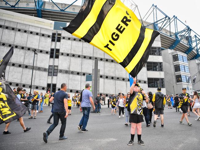 Every footy fan entering the MCG on Saturday will be scanned by handheld metal detectors and their bags will be searched. Picture: Jason Edwards