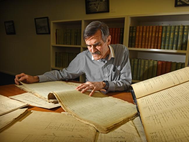 08/07/20 - Citizen scientist Mack Benoy with old diaries from 1843-1858 which has weather recordings at the State Library. Picture: Tom Huntley